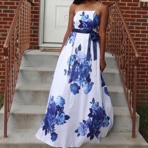 White and blue asymmetrical strapless prom dress, blue bow around the waist